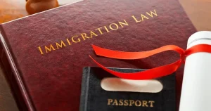 immigration law book and passport